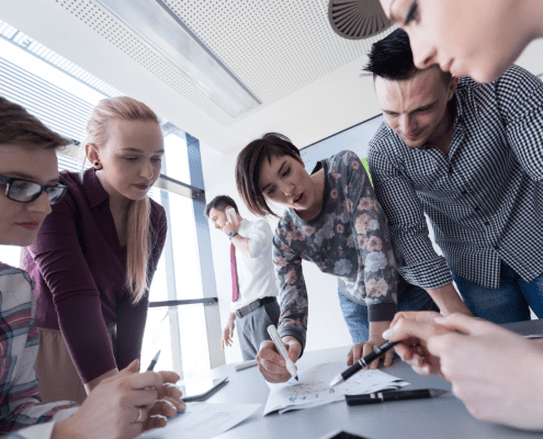 Employees using idea management software by Submit.com